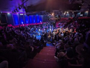 Evan Zane performing with orchestra at Nocturne Theatre